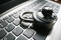 Black Combination Lock On Laptop Keyboard Representing Cyber Security Royalty Free Stock Photo