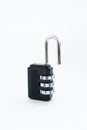 Black combination lock for a suitcase on a white Royalty Free Stock Photo