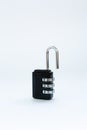 Black combination lock for a suitcase on a white Royalty Free Stock Photo