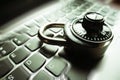 Black Combination Lock Zoom Burst On Laptop Keyboard Representing Cyber Security Royalty Free Stock Photo