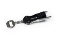 Black combined corkscrew and bottle opener on white background Royalty Free Stock Photo