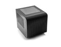 A black, compact, cube-shaped computer case isolated on a white background. Royalty Free Stock Photo