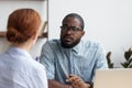 Boss listening candidate female consider her unsuitable for job