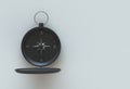 Black compass isolated on white table Royalty Free Stock Photo