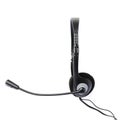 Black computer headset with a microphone isolated over white background Royalty Free Stock Photo
