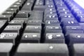 Black and computer keyboard close-up. Overlooking the enter button Royalty Free Stock Photo