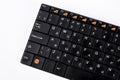 Black computer keyboard, white background. Royalty Free Stock Photo