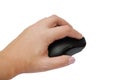 Black computer mouse in hand isolated on a white background. Close-up. Royalty Free Stock Photo