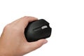 Black computer mouse in hand isolated on a white background. Close-up. Royalty Free Stock Photo