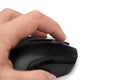 Black computer mouse in hand isolated on a white background. Close-up. Royalty Free Stock Photo