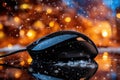 Black computer mouse on reflective surface with bokeh and snowflakes Royalty Free Stock Photo