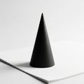 Cone stands on a stack of white paper sheets placed on a flat Royalty Free Stock Photo