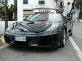 Black convertible Ferrari F 430 in Puerto Banus Royalty Free Stock Photo