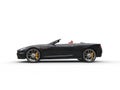 Black convertible sports car - side view Royalty Free Stock Photo