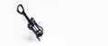 Black corkscrew on white studio background with copy space. Wine opener. Royalty Free Stock Photo