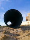 Black corrugated pipe for water canalization Royalty Free Stock Photo