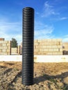 Black corrugated pipe for water canalization Royalty Free Stock Photo