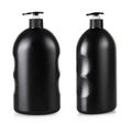 Black cosmetic bottle with pump isolated on white background Royalty Free Stock Photo