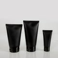 Black cosmetic tube cream lotion facial foam sunscreen makeup beauty cosmetic foundation with background