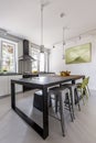 Black countertop table in minimalist kitchen