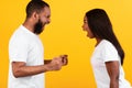 Black couple arguing, woman and man yelling at each other Royalty Free Stock Photo