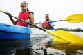 Black couple canoeing in a lake