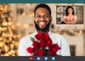 Black couple having romantic online date, celebrating anniversary