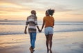 Black couple, holding hands and on beach with sunset for romance, celebrate relationship or holiday together. Love Royalty Free Stock Photo