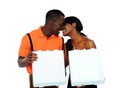 Black couple kissing and holding pizza boxes Royalty Free Stock Photo