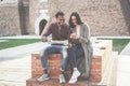 Black couple looking city map app during vacation tour - Happy african people having fun in down town center - Travel, love and Royalty Free Stock Photo