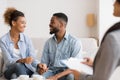 Black Couple Smiling And Laughing On Sofa After Effective Therapy Royalty Free Stock Photo