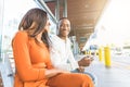 Black couple waiting for the bus at station Royalty Free Stock Photo