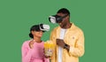 Black couple wearing VR headset, watching movie Royalty Free Stock Photo