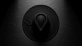 A black cowboy hat rests on a flat dark surface under focused lighting Royalty Free Stock Photo