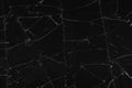 Black cracked glass texture background. Crack on the glass. Broken screen. Broken dark phone. White cracks in glass