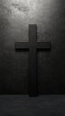 A black cross is standing in front of a wall Royalty Free Stock Photo