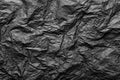 Black crumpled paper texture