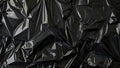 Black crumpled plastic wrap texture, dark background, industrial concept. Generative AI Royalty Free Stock Photo