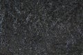 Beautiful black ridged textured surface. Stone textured background.