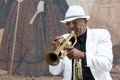 Black cuban musician playing the trumpet