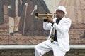 Black cuban musician playing the trumpet