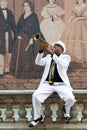 Black cuban musician playing the trumpet
