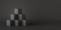 Black cube boxes with dark wall background. 3D rendering. Royalty Free Stock Photo