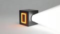Black cube with glowing orange rectangular cutout Royalty Free Stock Photo