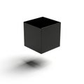 A black cube hovers against a white background, casting a soft shadow Royalty Free Stock Photo
