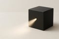 A black cube with a light beam coming out of a small hole. Space for text. Royalty Free Stock Photo