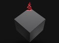 Black cube slowly dissolving into red crystals Royalty Free Stock Photo