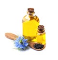 Black cumin oil with nigella sativa flowers Royalty Free Stock Photo