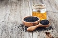 Black cumin oil with seeds Royalty Free Stock Photo