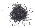 Black cumin seeds isolated on white background. Heap of black nigella seeds. Nigella sativa. Top view. Royalty Free Stock Photo